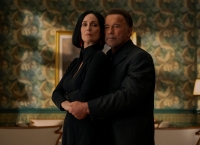 Arnold Schwarzenegger și Carrie-Anne Moss