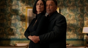 Arnold Schwarzenegger și Carrie-Anne Moss